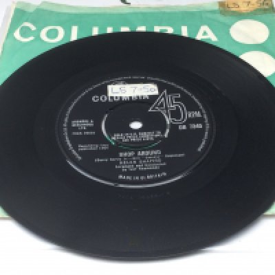 A rare Helen Shapiro 7" single Shop Around b/w He Knows How To Love Me. Condition Ex.