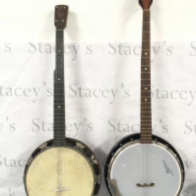 Two banjos with soft carry cases and a soprano ukulele with a hard carry case (3).
