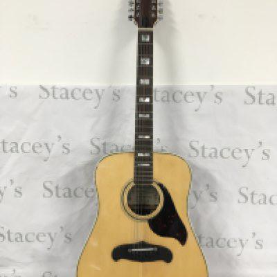 A Kimbara 12 string acoustic guitar with soft carry case.