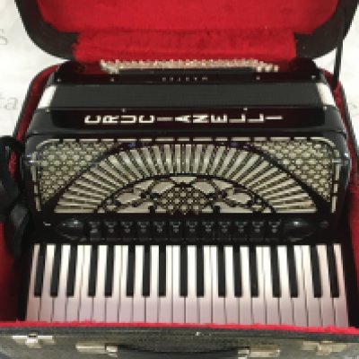 Two cased accordions comprising a Crucianelli model and one other.