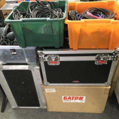A brand new Gator case plus one other case plus various leads and stands.