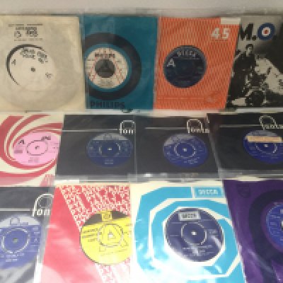 A bag and a box of David Essex LPs, 12" and 7" singles including promo discs and rare releases.
