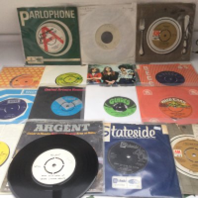A collection of 7" singles by various artists including an Argent test pressing, a Simon Dupree demo disc and others.