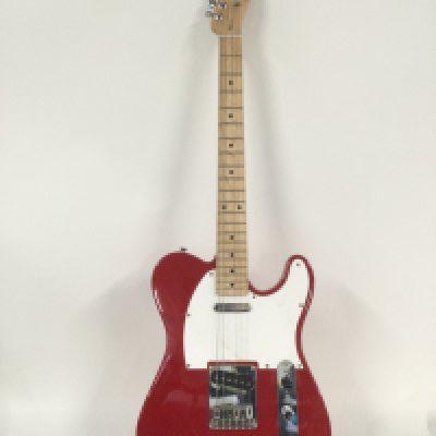 A Fender Squier Telecaster in red. Comes with a soft carry case.