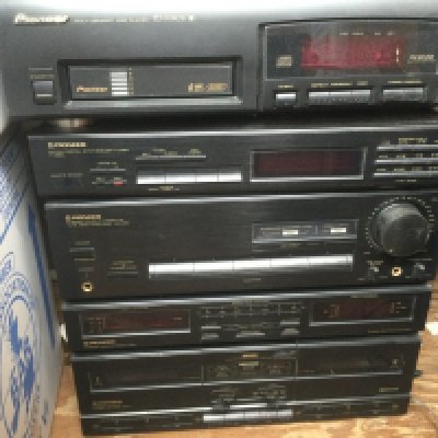 A Pioneer hifi stacking system comprising turntable, Multi CD player, amplifier etc plus a pair of speakers.