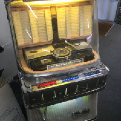 A Bal-Ami 200 jukebox. Powers up but not fully working, for restoration. No keys.