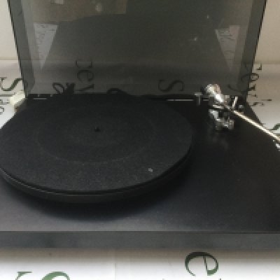 A boxed Rega Planar 3 record player.