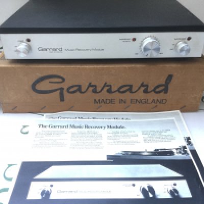 A boxed Garrard MRM 101 music recovery module, designed to suppress clicks and pops on playback of old vinyl. Comes with manuals.