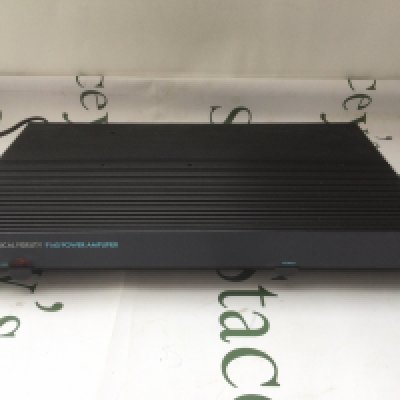 A boxed Musical Fidelity P140 power amp.