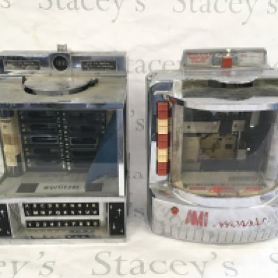 Two jukebox wall boxes for restoration comprising Wurlitzer and AMI examples.