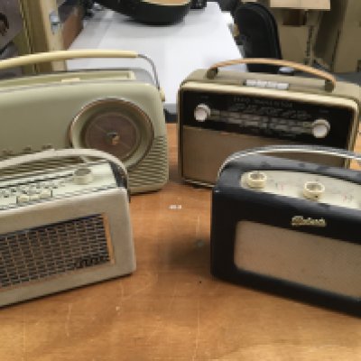 Eight vintage radios comprising Bush, Hacker, Ecko and other examples.