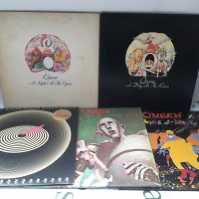 Five Queen LPs comprising A Night At The Opera, News Of The World and others.