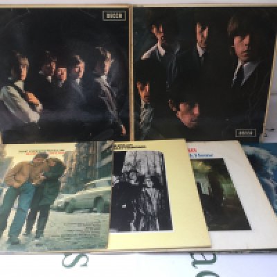 Twelve LPs comprising early UK pressings by various artists including The Rolling Stones, Bob Dylan, Cream and others.