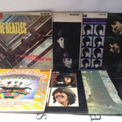 A collection of early pressings of Beatles LPs, EPs and 7" singles including Please Please Me (not black and gold labels), a US Capitol issued Magical Mystery Tour, Let It Be and others.