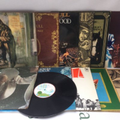 Two bags containing 24 prog, psych and folk rock LPs by various artists including Jethro Tull, Dada, Johnny Winter and others.