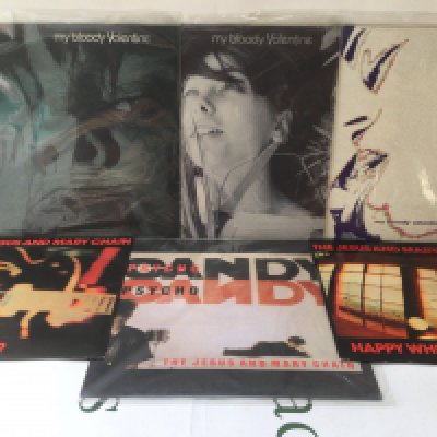 Three My Bloody Valentine 12" singles, a Jesus & Mary Chain LP and two 12" singles.