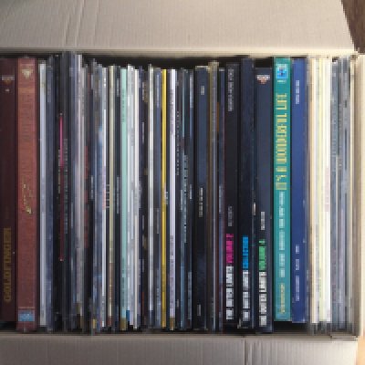 Two boxes of laser discs comprising the original Star Wars Trilogy, Three volumes of The Twilight Zone, An Indiana Jones Trilogy etc