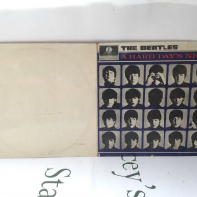 Two Beatles LPs comprising a numbered side loading 'White Album' (no portraits) and an early UK mono pressing of A Hard Day's Night.