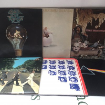 Twelve rock and prog rock LPs by various artists including The Beatles, Pink Floyd, Triumvirat and others.