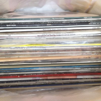 A collection of LPs by various artists including Isaac Hayes, Bob Dylan, Roxy Music and others.