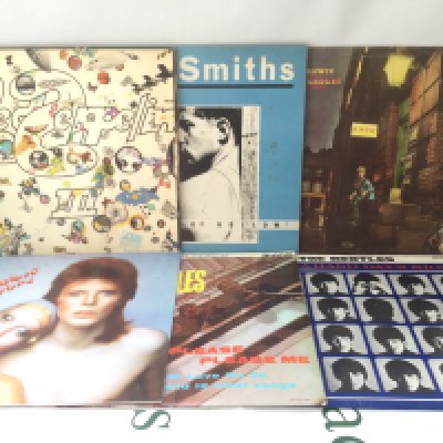 Twelve LPs by various artists including Led Zeppelin, The Beatles, David Bowie and others. Includes Led Zeppelin III on red/plum Atlantic labels, early UK Please Please Me (not black and gold labels) and others.