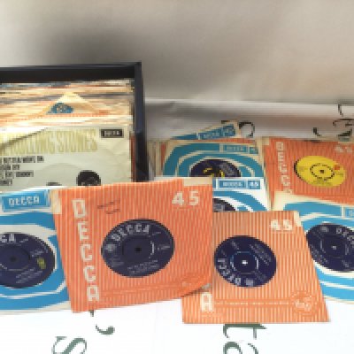 A record case of Rolling Stones 7" singles and EPs.