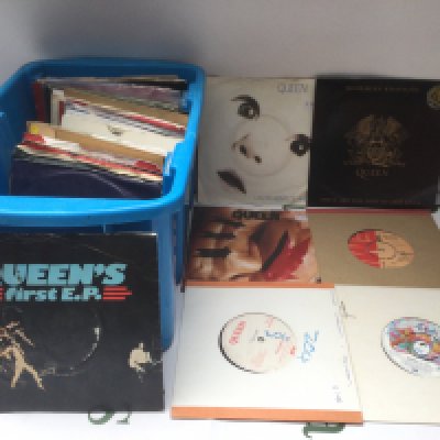 A collection of Queen 7" singles and EPs.