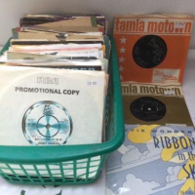 A collection of Tamla Motown 7" singles by various artists including Smokey Robinson, Stevie Wonder and others.