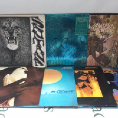 Seven Santana LPs comprising Abraxas, Caravanserai and others.