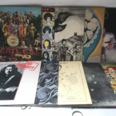 Ten rock LPs by various artists including The Beatles, The Who, Rolling Stones and others.