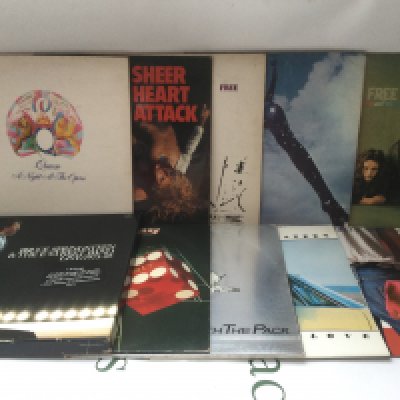 Ten rock LPs by various artists comprising Queen, Free, Bruce Springsteen and Bad Company.