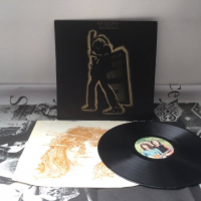 A first UK pressing of Electric Warrior by T Rex complete with inner sleeve and poster. EX/EX.