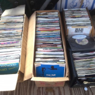 Six small boxes and a record case of 7" singles including some picture discs and promos. Various artists including The Jam, Prince, David Bowie and many more.