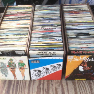 Eight small boxes of 7" singles including some promos and picture discs. Various artists including The Smiths, Kraftwerk, Dead Kennedys and many more.