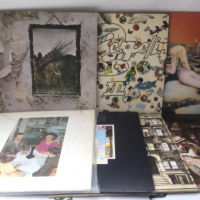 Seven Led Zeppelin LPs including Led Zeppelin II, III, IV, Physical Graffiti and others. Led Zeppelin IV is on red/plum Atlantic labels and has three small feelable scratches.