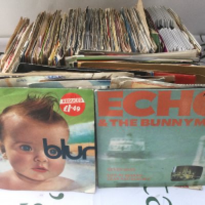 A collection of 7" singles by various artists including Blur, Depeche Mode, The Jam and others,