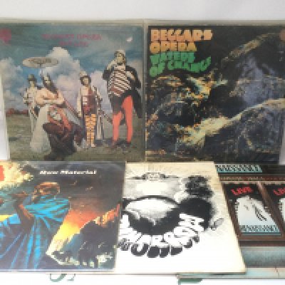 Five early UK pressings of prog rock LPs by various artists including Beggars Opera, Raw Material, Tomorrow and Renaissance.