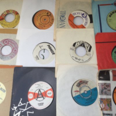 A record case of reggae 7" singles including some Jamaican pressings.