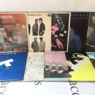 Two bags containing twenty punk and post punk LPs by various artists including The Undertones, The Skids, Tubes and others.