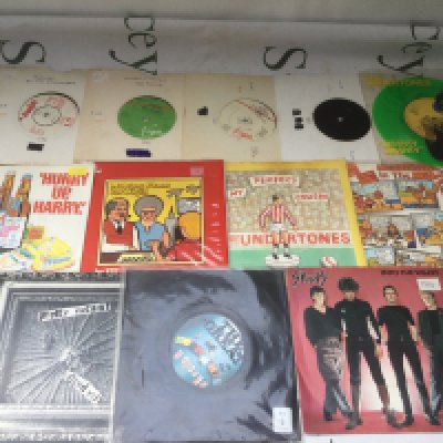 A collection of punk 7" singles by various artists including Sex Pistols, The Stranglers, Sham 69 and others.