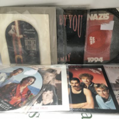 Fifteen Queen and related 12" and 7" singles including a Great Pretender shaped disc, Barcelona picture disc and others.