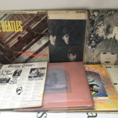 Seven Beatles and solo LPs comprising early UK mono pressings including Please Please Me (not black and gold labels), With The Beatles, Revolver and others plus a US pressing of Magical Mystery Tour etc.