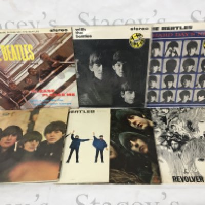 Fourteen Beatles LPs including original UK pressings and reissues. Please note all the early albums up to Rubber Soul are later repressings on black and silver Parlophone labels.