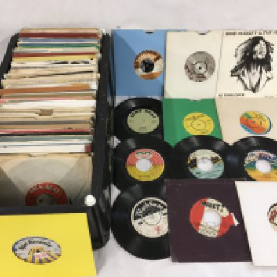 A collection of reggae 7" singles including Jamaican pressings.