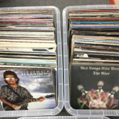 Three boxes of LPs and 12" singles by various artists including Paul McCartney, Kate Bush, Teddy Pendergrass and others plus a record case of album and 12" record sleeves.
