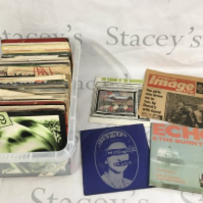 A collection of 7" singles and EPs by various artists including PiL, Southern Death Cult, Sex Pistols and others.