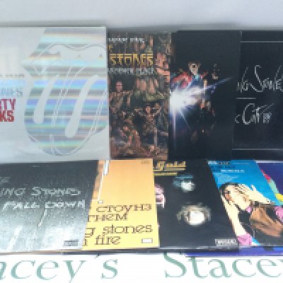 Two bags containing six Rolling Stones LPs plus a 12" single and two CD box sets comprising 'A Bigger Bang', 'Another Time, Another Place' on bronze vinyl (sealed) plus others.