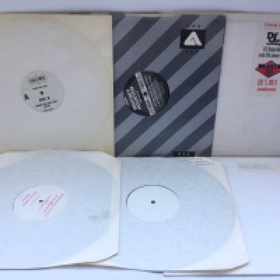 Six white label 12" promo discs by various artists including The Beastie Boys, Erasure, Gary Numan, Eric B and Whitney Houston.