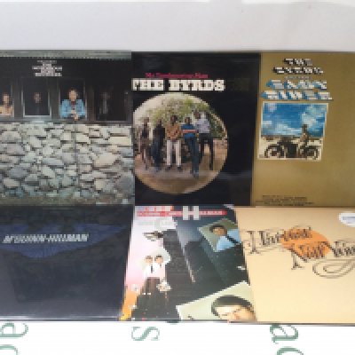 Twelve folk rock LPs by Neil Young, The Byrds and related. Includes a Neil Young promo disc.