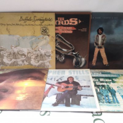 Twelve folk rock LPs by various artists including Buffalo Springfield, Stephen Stills, Joni Mitchell and others. Includes a Byrds promo disc.